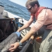 Taylor Chapple holding a shark