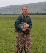 FWCS undergraduate marks a crane on his internship in southern Oregon. 
